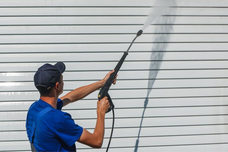 Powerwashing Technician Performing Service